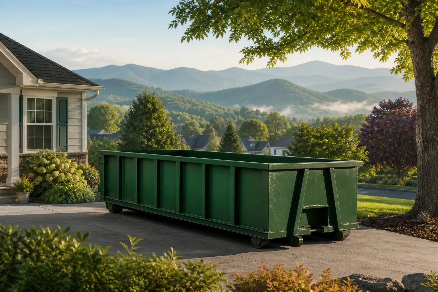 Green roll-off dumpster beside a home in the Appalachian region